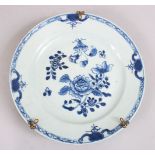 A GOOD 18TH CENTURY CHINESE BLUE & WHITE PORCELAIN PLATE, decorated with floral scenes, mounted with