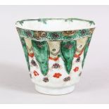 A GOOD CHINESE OCTAGONAL KANGXI PERIOD FAMILLE VERTE PORCELAIN WINE CUP, with lappet style