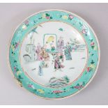 A 19TH CENTURY CHINESE TURQUOISE FAMILLE ROSE PORCELAIN DISH, the plate decorated with scenes of