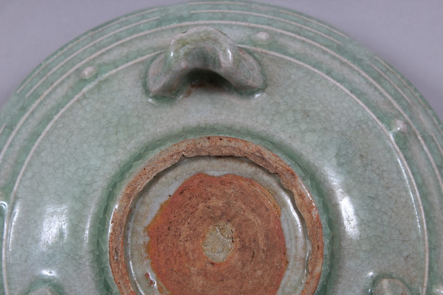 A GOOD CHINESE SONG STYLE PALE CELADON GROUND TRIPLE FOOT CENSOR, the body with moulded studs, the - Image 7 of 7