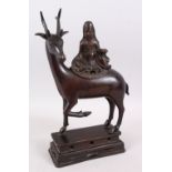 A 19TH CENTURY CHINESE BRONZE CENSER / BURNER OF A DEER, the deer in a gentle pose with one hoof
