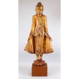 A LARGE DECORATIVE CHINESE / THAI CARVED GILDED WOOD BUDDHA / DEITY / GOD, the goddess stood upon