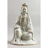 A 19TH CENTURY CHINESE BLANC DE CHINE FIGURE OF GUANYIN seated cross legged. 7.5ins high.