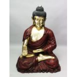 A LARGE PAINTED AND GILDED MODEL OF A SEATED BUDDHA, approx. 165cm high x 80cm wide x 75cm deep.