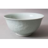 A CHINESE CLAIR DE LUNE & BLUE & WHITE PORCELAIN CARVED BOWL, the body of the bowl carved /