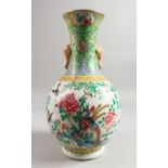 A GOOD 19TH CENTURY CHINESE FAMILLE ROSE BOTTLE VASE painted with birds, flowers and insects