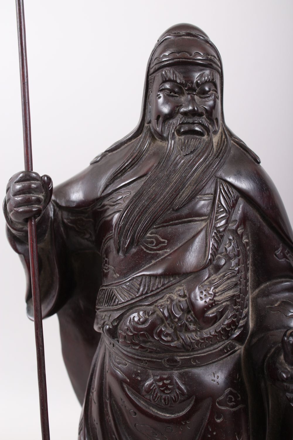 A GOOD 19TH / 20TH CENTURY CHINESE HARDWOOD HARVED FIGURE OF A BEARDED WARRIOR, stood on a tree - Image 2 of 9