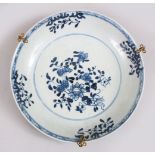 A GOOD 18TH CENTURY CHINESE BLUE & WHITE PORCELAIN PLATE, decorated with floral scenes, mounted with
