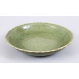 A GOOD CHINESE MING STYLE LONGQUAN CELADON GROUND PORCELAIN DISH, The dish carved with scenes of