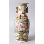 A 19TH CENTURY CHINESE CANTON FAMILLE ROSE PORCELAIN VASE, the body of the vase decorated with