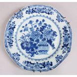 A GOOD 18TH CENTURY CHINESE BLUE & WHITE PORCELAIN PLATE, decorated with floral scenes, mounted with