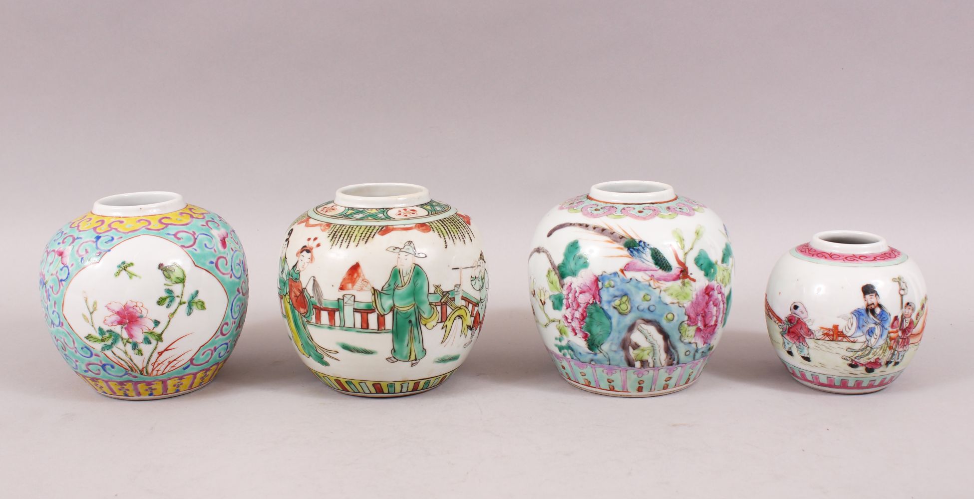 FOUR 19TH / 20TH CENTURY CHINESE FAMILLE ROSE PORCELAIN GINGER JARS, each decorated with scenes of