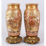 A GOOD PAIR OF JAPANESE MEIJI PERIOD SATSUMA IMMORTAL VASES , each vase decorated with two panels of