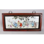 A 20TH CENTURY CHINESE FAMILLE ROSE REPUBLIC STYLE FRAMED PLAQUE, the plaque depicting scenes of