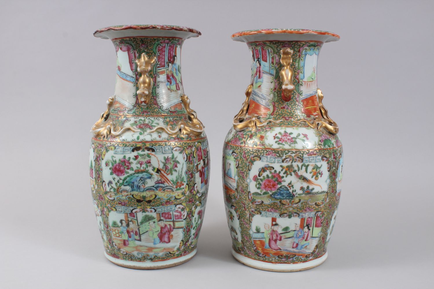A PAIR OF 19TH CENTURY CHINESE CANTON FAMILLE ROSE VASES, decorated with panels of figures within - Image 2 of 6
