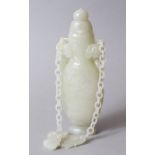 A GOOD QUALITY CHINESE CARVED CELADON JADE LIDDED URN / VASE, the vase with twin chilong style