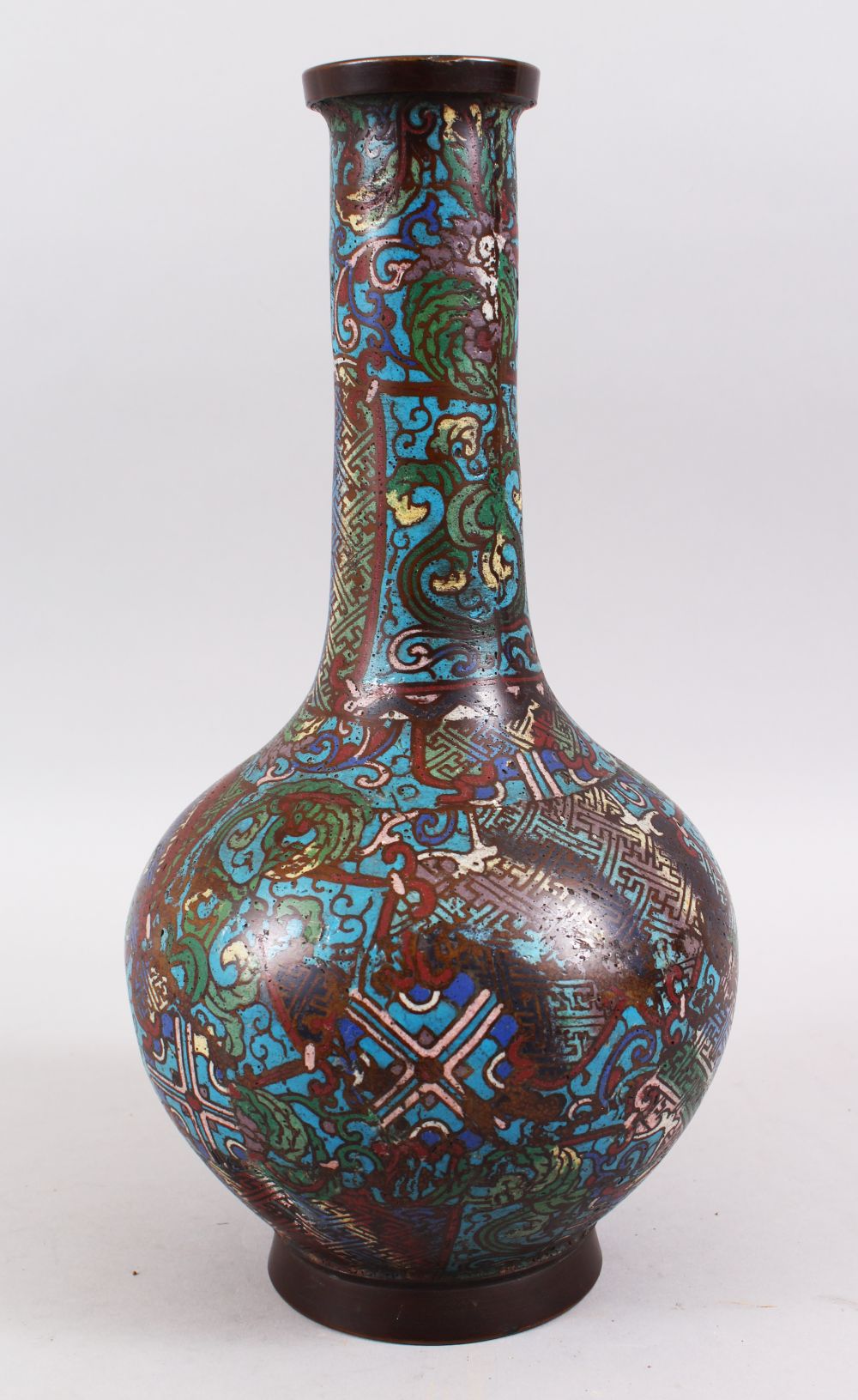 A GOOD CHINESE MING STYLE CLOISONNE BOTTLE VASE, The body decorated in geometric design, the base