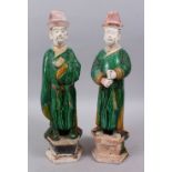 A GOOD PAIR OF MING DYNASTY SANCAI POTTERY TOMB FIGURES, with removable heads, with decorated