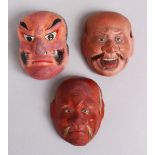 THREE JAPANESE MEIJI PERIOD PAPER MACHE / LACQUER NOH MASKS, two mass with inlaid eyes, the other