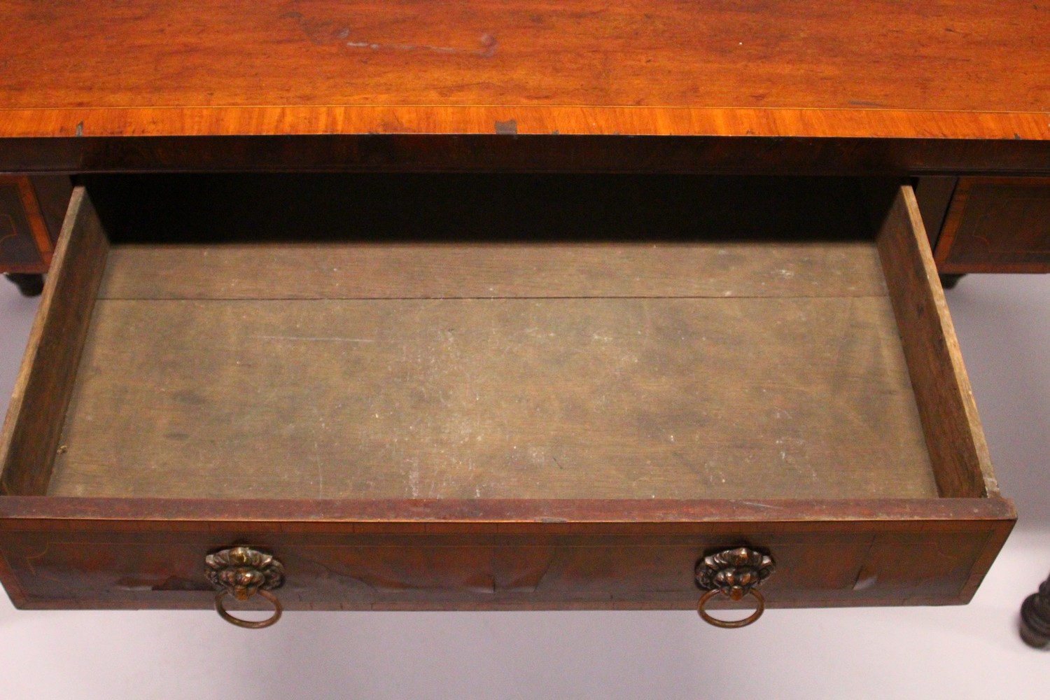 A 19TH CENTURY MAHOGANY AND SATINWOOD BANDED SERVING TABLE, with three frieze drawers having lion - Image 5 of 8