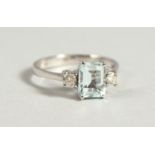 AN 18CT WHITE GOLD, AQUAMARINE AND DIAMOND ART DECO STYLE RING.