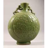 A LARGE GREEN CELADON MOON FLASK. 1405ins high.