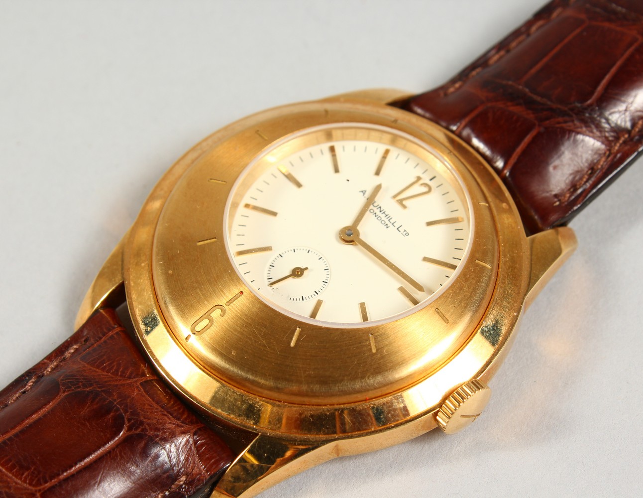 A HEAVY 18CT YELLOW GOLD DUNHILL OPEN BACK WRISTWATCH. Dunhill Ltd ...