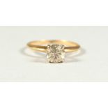 AN 18CT GOLD SOLITAIRE DIAMOND RING.