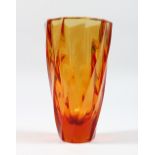 AN AMBER COLOURED SPIRAL FLUTED GLASS VASE, signed Moser. 6.75ins high.