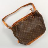 A LOUIS VUITTON LIGHT BROWN SHOULDER BAG.