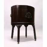 A GOOD GEORGE III MAHOGANY OVAL WINE COOLER, with crossbanded top opening to reveal a leaded