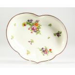 A WORCESTER SHAPED CRESCENT DISH painted with flowers. 11ins wide.