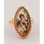 A GEORGIAN GOLD OVAL PORTRAIT RING, a young girl with a dog.