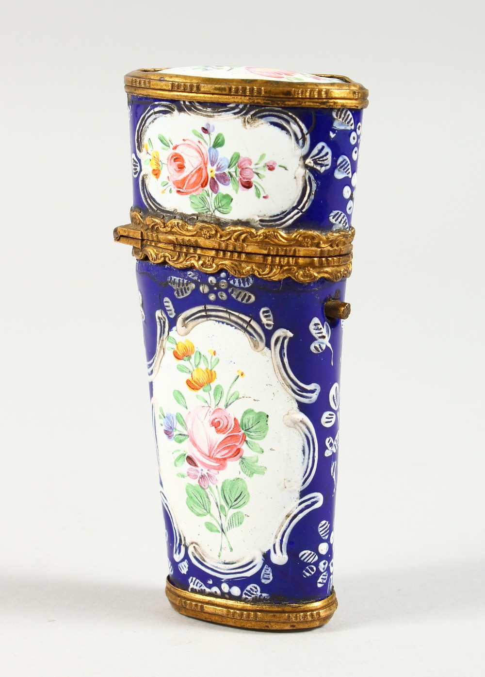 AN 18TH CENTURY BILSTON BLUE ENAMEL ETUI, with fitments and panels of flowers. 4ins long.