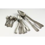 A GROUP OF OLD PEWTER SPOONS.