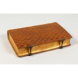 A LEATHER BOOK SHAPED BOX. 6.75ins x 4.25ins.