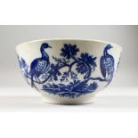 A WORCESTER BLUE AND WHITE CIRCULAR BOWL, Hancock pattern with birds and foliage. Crescent mark in