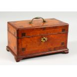 A GOOD GEORGE III WALNUT CROSSBANDED CADDY AND COVER, with carrying handle on bracket feet, being