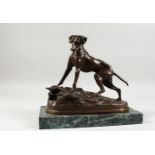 AN AMUSING BRONZE MODEL OF A DOG HUNTING A RABBIT, on a rectangular marble base. 11.5ins long.