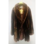 A PHILIP HOCKLEY OF LONDON FUR COAT.