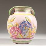 A CROWN DEVON FLORAL DECORATED VASE. 7ins high.