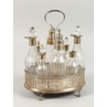 A GEORGE III PIERCED OVAL EIGHT BOTTLE CRUET. London 1779.