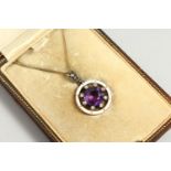 AN AMETHYST, DIAMOND AND ENAMEL PENDANT, on a chain in a "JAY'S" of LONDON leather box.