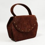 A BRUNO MAGLI BROWN SUEDE BAG.