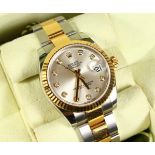 A SUPERB UNUSED LADIES' STEEL AND GOLD DIAMOND FACED ROLEX, OYSTER PERPETUAL DATE JUST WRISTWATCH