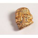 A BRASS HEAD VESTA.