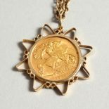 A 1912 GOLD HALF SOVEREIGN in a chain.