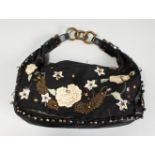 A LARGE CHLOE BLACK AND FLORAL BAG, in a Chloe bag.