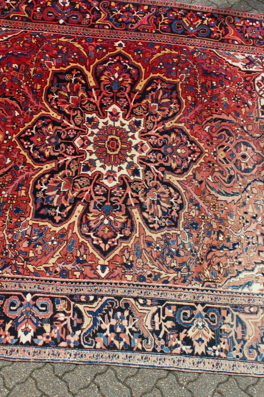 A PERSIAN STYLE HERIZ CARPET, 20TH CENTURY, red ground with allover stylised floral decoration (some - Image 3 of 9