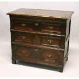 A GOOD 18TH CENTURY OAK CHEST, with a plank top, three long geometrically moulded drawers, on